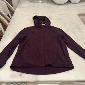 Women’s Lululemon waterproof lined jacket with hood - size 4